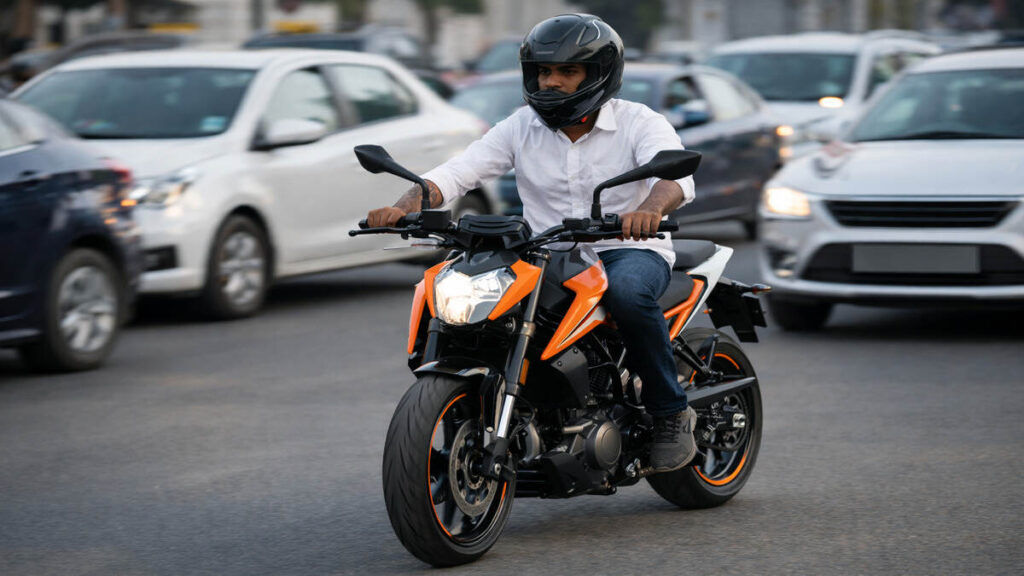 KTM 250 Duke rider cruising through city traffic in daylight