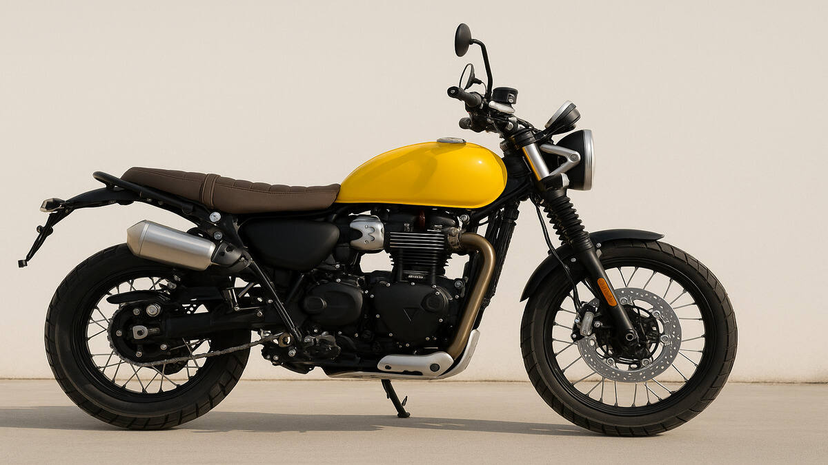 Triumph Scrambler 400X side view in yellow colour on clean background