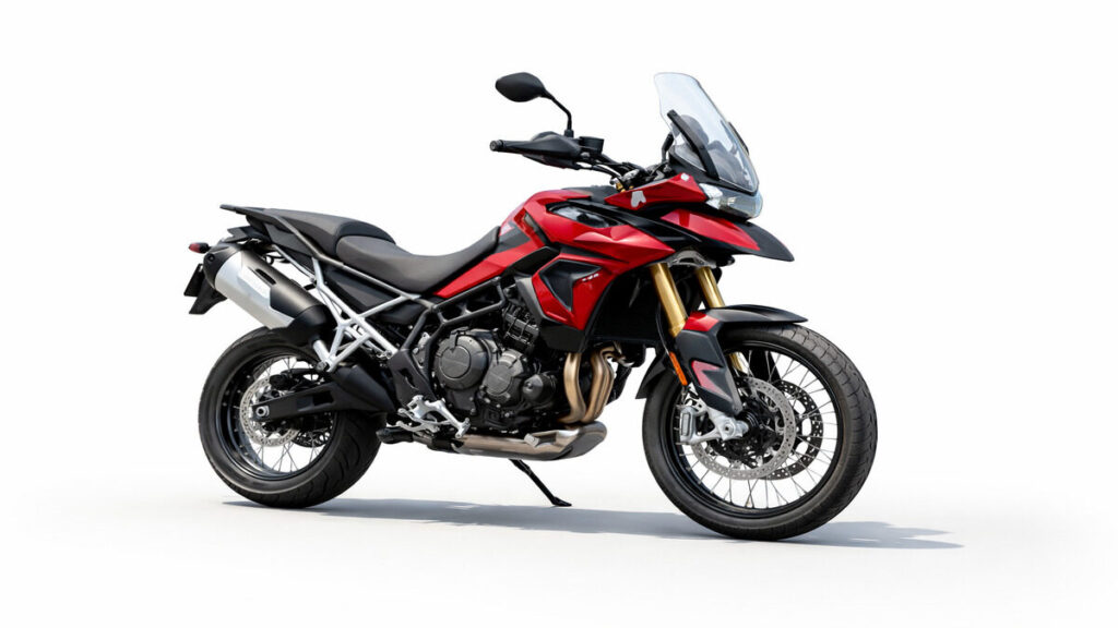 Red Triumph Tiger 900 adventure motorcycle side profile on plain background
