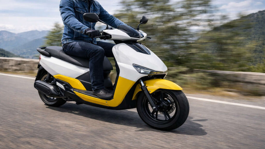 Ather Rizta electric scooter riding at speed on a road