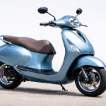 Bajaj Chetak Electric scooter in blue color on plain background